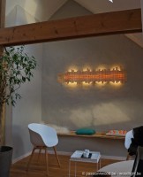 Design wand verlichting in geweven esdoorn hout